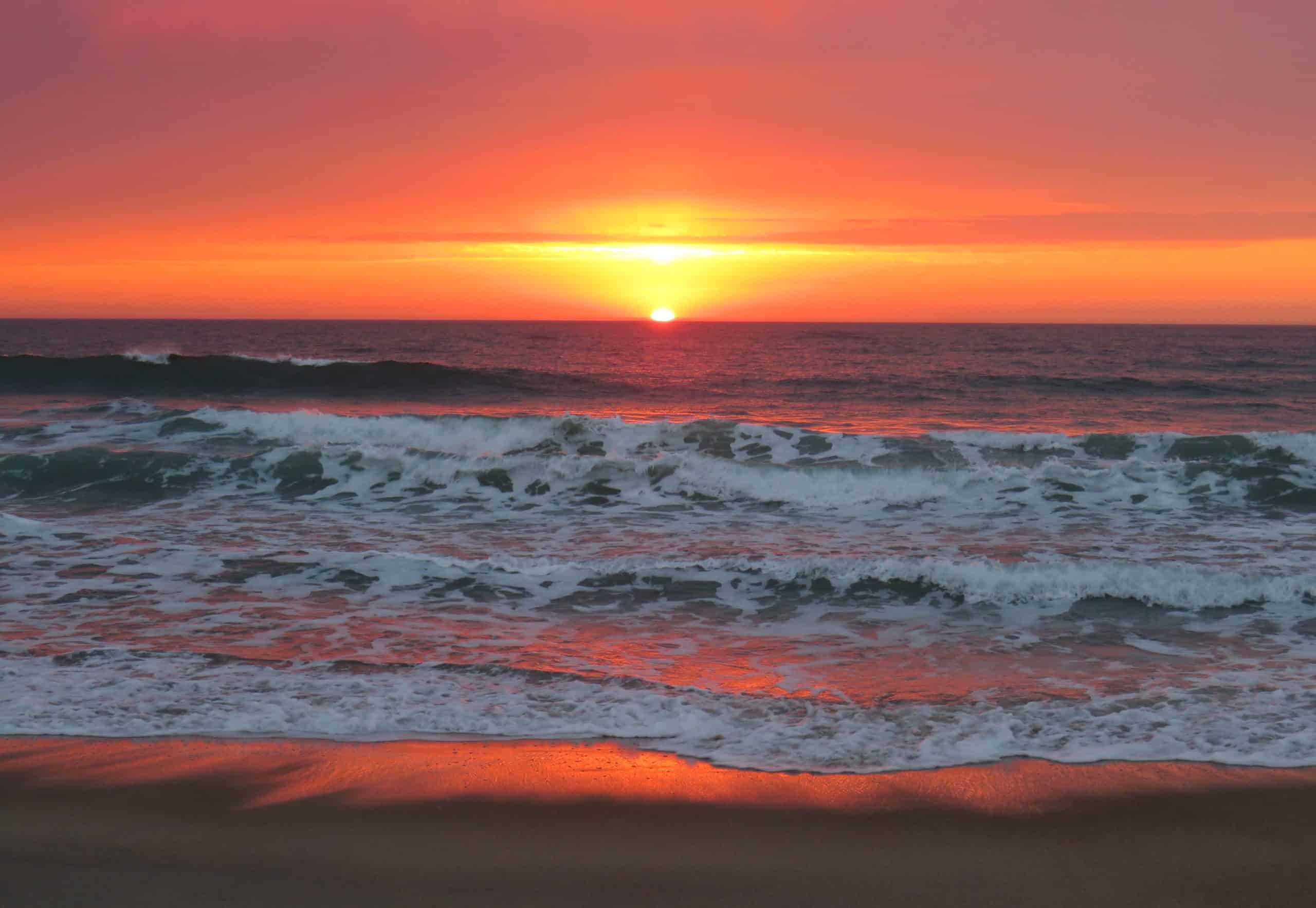 Sunset over the water, East End